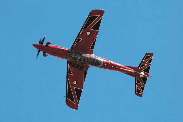 Pilatus PC-21 A54-22 of the RAAF Roulettes flies inverted during the 2019 Australian International Airshow at Avalon, Victoria. Source: Department of Defence