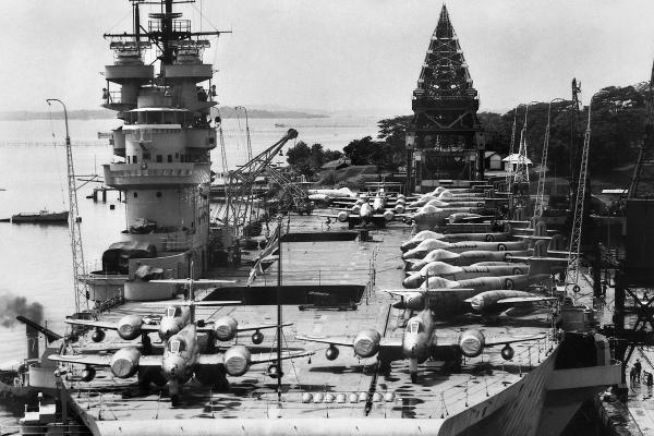 Gloster Meteor jets bound for Korea, on the fight deck of HMS Unicorn, Singapore, 1952. Source: AWM, JK0393