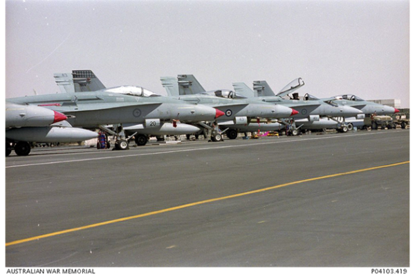 F/A-18 Hornet aircraft from 75 Squadron on the flight line at Al Udeid airbase.