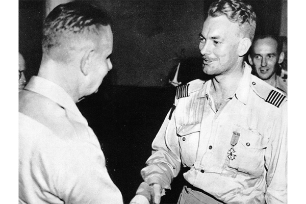 Wing Commander Lou Spence receiving the US Legion of Merit on 22 August 1950