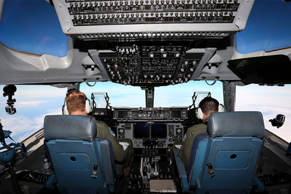 No 36 Squadron Pilots, Flight Lieutenant (FLTLT) Simon Marshall (left) and FLTLT Timothy Oldfield on the flight deck of a C-17A Globemaster bound for Antartica.